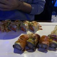 Seaworld Roll · Spicy tuna, crunch, lobster tempura, avocado on top with special sauce.