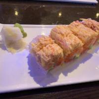 Kumo Roll · Spicy tuna, yellowtail, salmon, avocado, crunch top with spicy king crab, crabmeat, mango an...