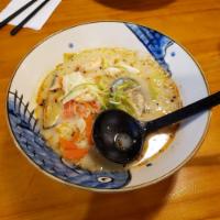 Champon Seafood Ramen · Seafood infused - porkbone broth, mussell, shrimp, squid, kani, scallion, cabbage, carrot an...