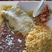 Chicken Enchiladas · 3 enchiladas with corn tortillas, salsa ranchera and melted cheese on top served with rice, ...