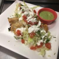 Flautas · 3 crispy corn tortillas stuffed with chicken, onion & cilantro served with avocado sauce and...