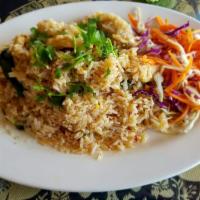 Sweet Basil Fried Rice · Spicy fried rice with bell peppers, cilantro, chili, and basil leaves. Meat of your choice (...