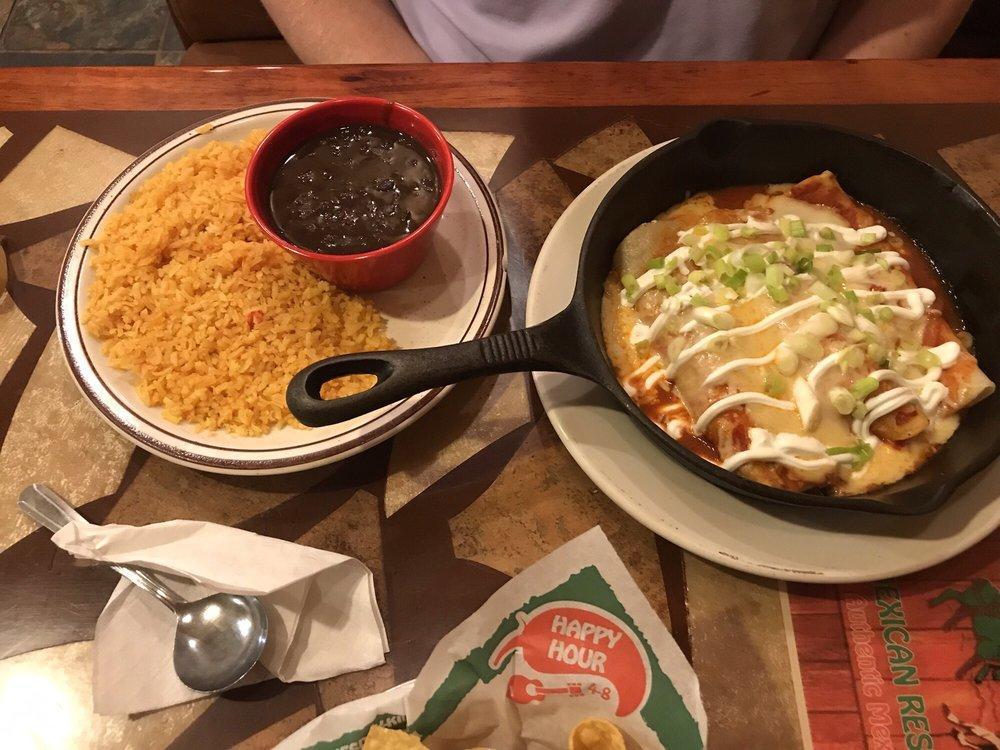 Enchilada · Chicken or beef. Served with 2 sides black or fried beans, guacamole salad with sour cream, yellow Mexican rice or brown Mexican rice.