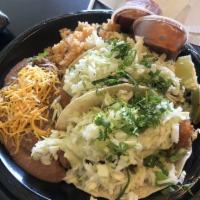 Taco Combo Includes Beans and Rice Plate · 