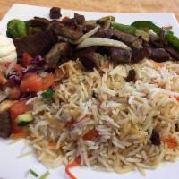 Lamb Gyro Platter · Lamb gyro cooked with onions, sweet peppers served with afghan rice, chopped salad, and tzat...