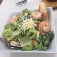 Classic Caesar Salad · Crisp romaine, Parmigiano, garlic croutons, Caesar dressing.