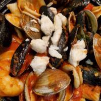 Seafood Fra Diavolo · Shrimp, calamari, mussels, clams, crabmeat, spicy tomato sauce, linguini.