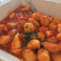 Gnocchi · Fresh mozzarella, basil, our famous tomato sauce.