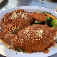 Chicken Fantasia · Lightly fried breaded chicken breasts, prosciutto, spinach, mushrooms, melted mozzarella and...