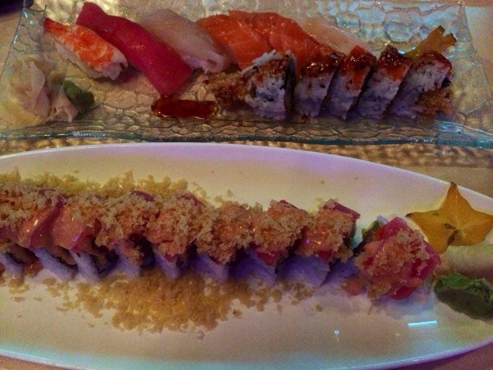 Mafia Roll · Tuna, avocado, tempura flakes on top with tuna, masago, sesame seeds, and crunchy served with spicy mayo.
