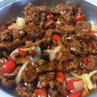 Beijing Beef · Crispy beef, red bell peppers and onions in a sweet-tangy sauce. Spicy.