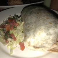 Carne Asada Burrito · Grilled steak. Served in flour tortilla with cheese, red rice, black or pinto beans, pico de...