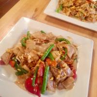 Pad Kee Mao Drunken Noodle · Flat noodle stir-fried with egg and mixed veggies in Thai Basil Sauce.
