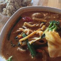 Red Curry · Red curry with coconut milk, bamboo shoot, bell pepper, green bean, and basil.
