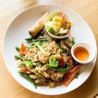 Basil Fried Rice · Fried rice with meat, egg, green bean, onion, bell pepper, and basil.