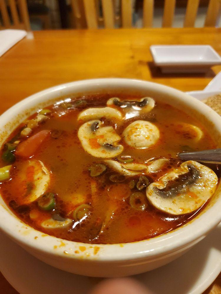 Tom Yum Soup · Thai hot and sour soup with lemon grass, kaffir lime leave, mushroom and tomato.