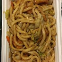 Yaki Udon · Choice of chicken, beef or shrimp stir fried noodles and vegetables with kani on top. Served...