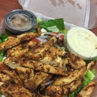 Blackened Chicken Salad · Grilled chicken in our own recipe of spices over spring mix with dried cranberries, goat che...