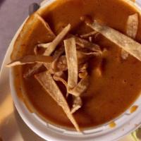 Roasted Tortilla Soup · Comes with sour cream, guacamole and tortilla strips.