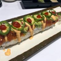 Spicy Dragon Roll · Shrimp tempura, crab, jalapenos and cucumber topped with spicy tuna, avocado, chili flakes a...