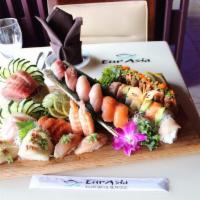 Eurasia Special Roll · Shrimp tempura, grilled asparagus and marinated shiitake mushroom topped with seared filet m...