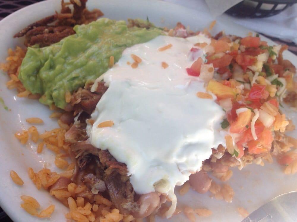 Super Burrito · Filled with rice, beans, cheese, sour cream, guacamole, pico de gallo, & your choice of meat.