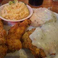 Chicken Fried Steak · Premium Angus beef steak, hand battered deep fried to a golden brown and topped with our hom...