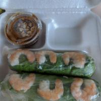 Spring Rolls · 2 pieces. Rice noodles, shrimp, and herbs wrapped with rice paper.