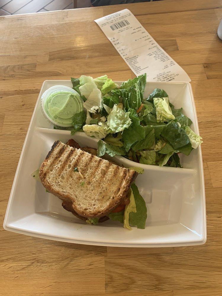 Avocado BLT Sandwich · Enjoy our version of a timeless favorite! We're adding Fresh-sliced Avocado and our Green Goddess dressing to take the classic Bacon, Lettuce &Tomato sandwich to a whole new level! Served between two slices of our delicious Rustic White bread.