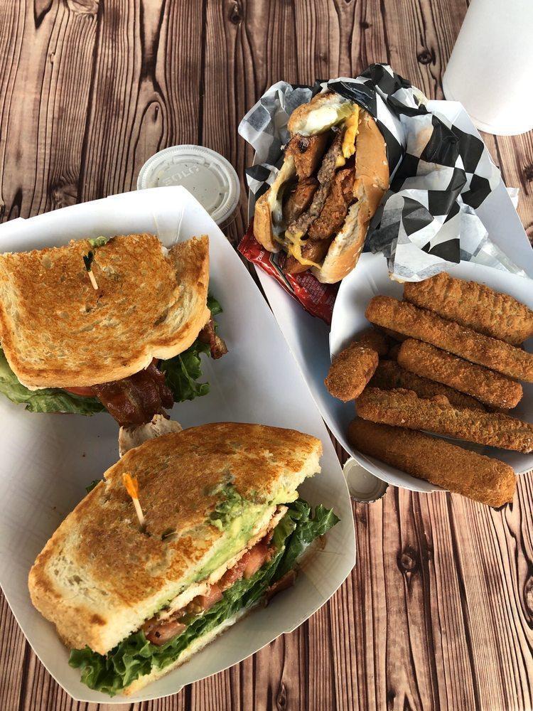 Club Sandwich · Mayo, lettuce, tomato, bacon, avocado and grilled chicken breast all on a grilled sourdough.
