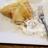 Traditional Crepe · Whipped cream, chocolate sauce and powdered sugar.