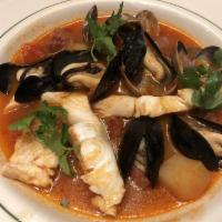 Ed's Portuguese Fish Stew · Fresh catch of day, mussels, manila clams, linguicia sausage.
