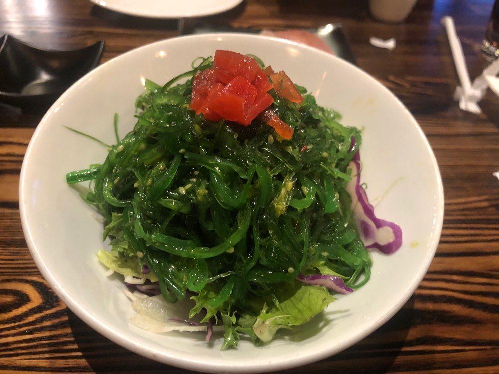 Seaweed Salad · On a bed of fresh mixed green salad.