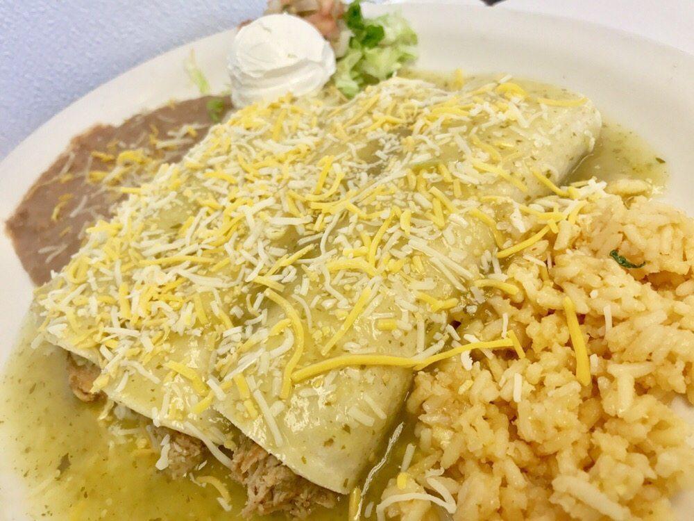 Enchiladas · 2 rolled corn tortillas stuffed with choice of meat shredded chicken, beef, pork, vegetables, cheese or chorizo.                             NOTE: Plate comes with rice, beans, salad and sour cream