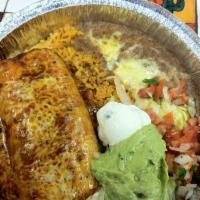 Chimichanga · Crispy burrito filled with your choice of meat shredded chicken, vegetables or beef topped w...