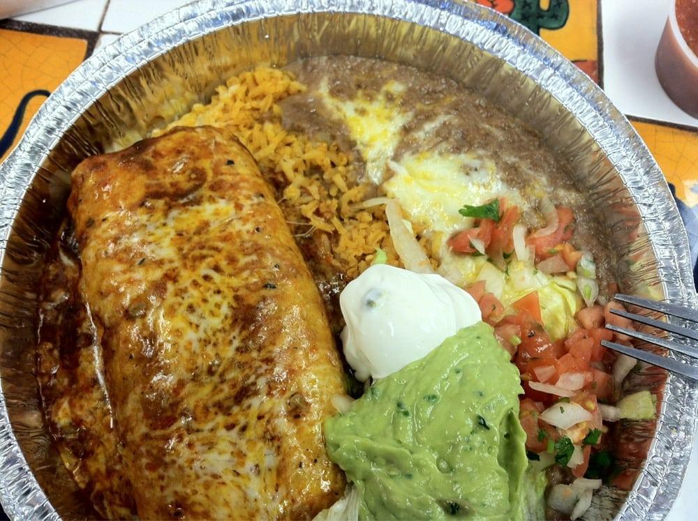 Chimichanga · Crispy burrito filled with your choice of meat shredded chicken, vegetables or beef topped with red sauce, sour cream and guacamole.
 NOTE: Plate comes with rice and beans.