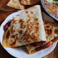 Quesadilla · Grilled, crispy flour tortilla filled cheese and choice of meat chicken, pork, beef, chorizo...