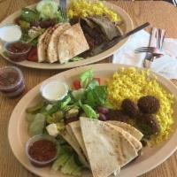 Falafel Plate · Tasty patties of ground chick peas, vegetables and a spice blend and fried. Served with rice...