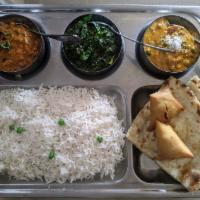 Saag Paneer · Fresh cottage cheese cooked with spinach.