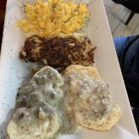 Country Breakfast · 2 biscuits, 2 eggs any style, biscuit sausage gravy and hash browns.