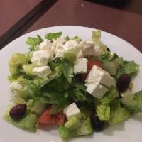 Greek Salad · Romaine letuce, red onion, green peppers, calamata olives, and feta cheese tossed with oil a...