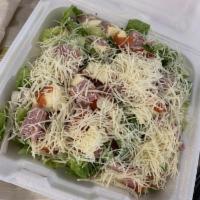 Italian Chopped Salad · Romaine lettuce, onion, red onion, tomatoes, green peppers, pepperoni, salami, ham and provo...
