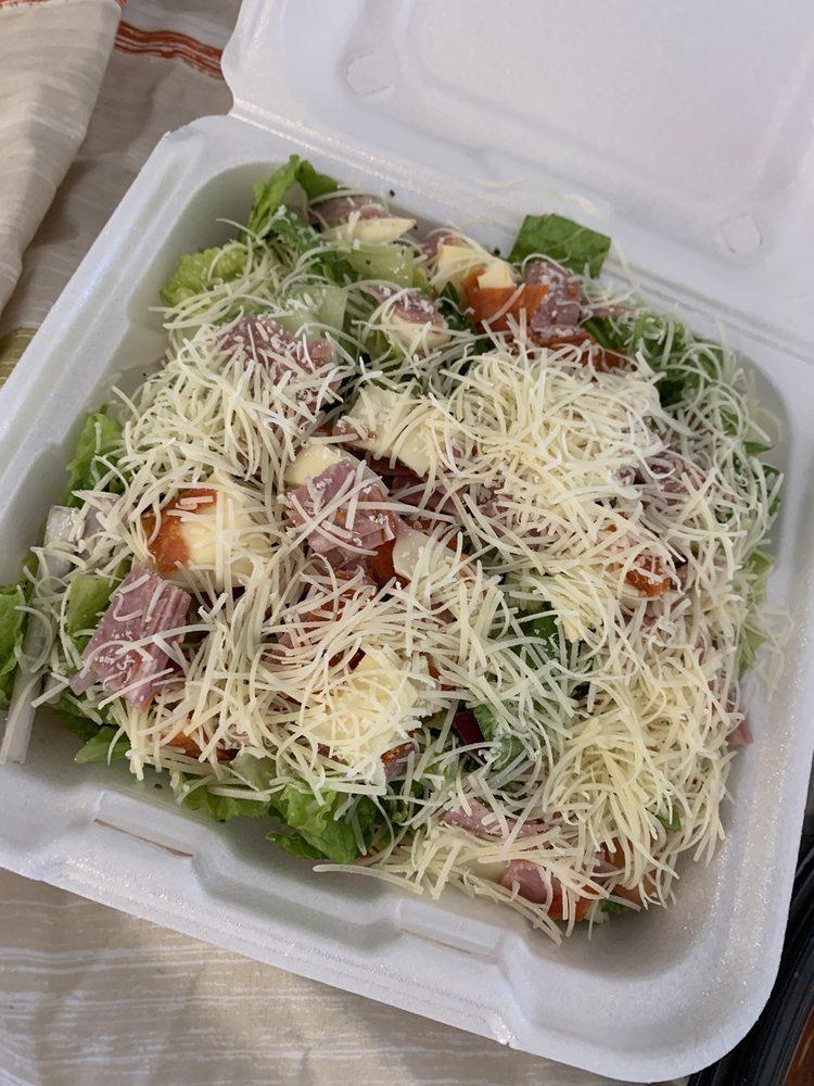 Italian Chopped Salad · Romaine lettuce, onion, red onion, tomatoes, green peppers, pepperoni, salami, ham and provolone cheese tossed with oil and red wine vinegar.