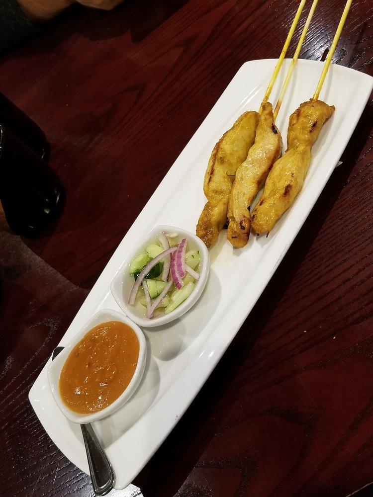 Chicken Satay 5 Skewers · Skewered chicken, marinated in coconut milk and curry. Served with cucumber vinaigrette and peanut sauce.