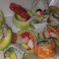 Seafood Naruto Roll · Tuna, salmon, White tuna, white fish,avocado,and crad stick wrapped in cucumber.