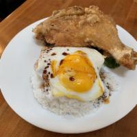 Fried Chicken Leg With Egg Over Rice Or Spaghetti · 
