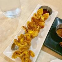 Crispy Blue Crab Rangoons · 5 pieces. Thai sweet and sour sauce.
Blue crab meat, scallions and curry infused cream
chees...