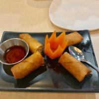 Shrimp & Chicken Fresh Spring Rolls · 2 pieces. Sweet and sour garlic sauce. With peanuts.