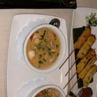 Toam Kha Gai · Our classic Thai chicken soup made with fresh lemongrass, coconut milk, chili-lime paste,
fr...