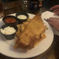 Donegal Bay Fish and Chips · Whole battered haddock fillet served with steak fries, Irish beans, creamy coleslaw and tart...